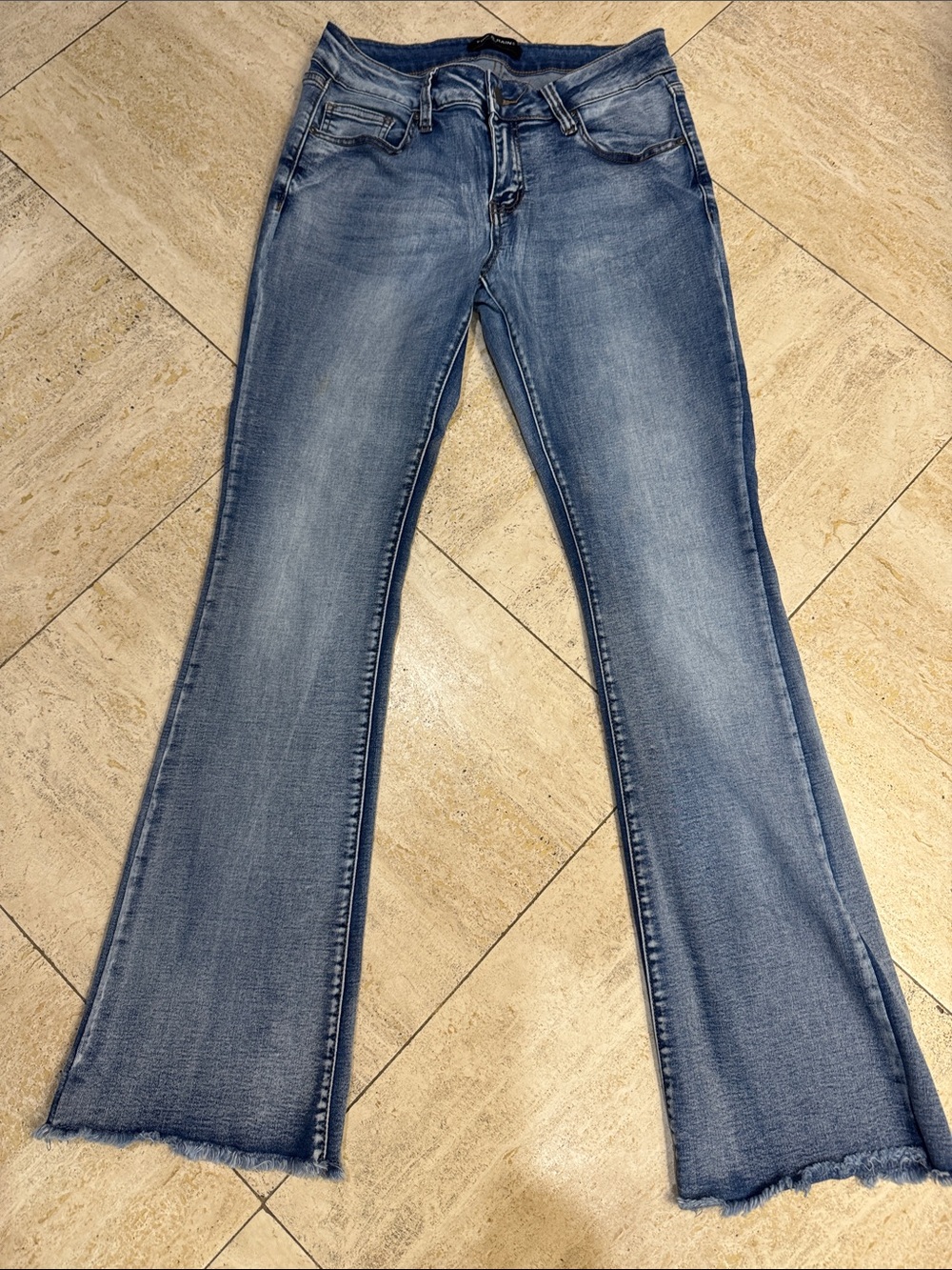 Light Blue Flare Jeans with Raw Hem